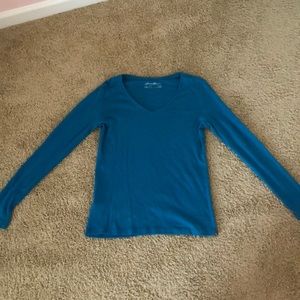 Turquoise long sleeve shirt. Size M